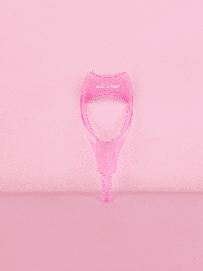 pink mascara shield on pink background